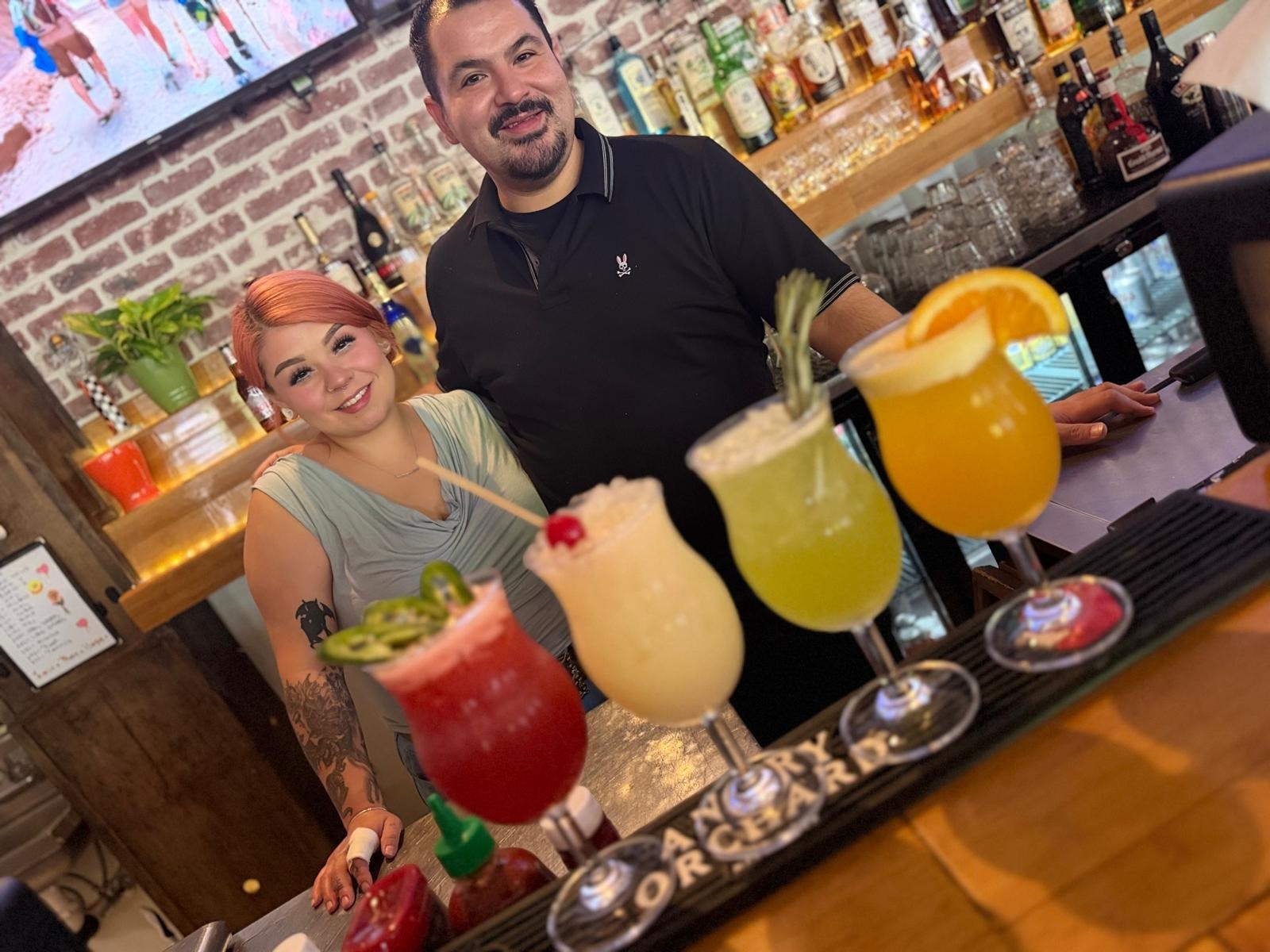 Westrail bartenders with signature cocktail lineup