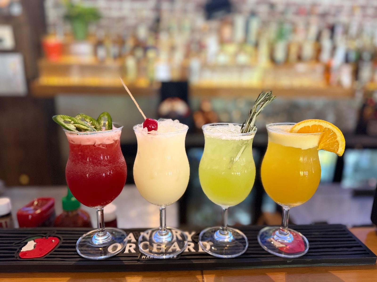 Four colorful cocktails at Westrail Tap and Tequila bar