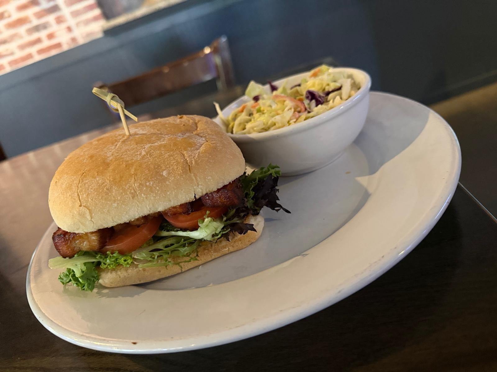 Pork sandwich with coleslaw in the dining room at Westrail