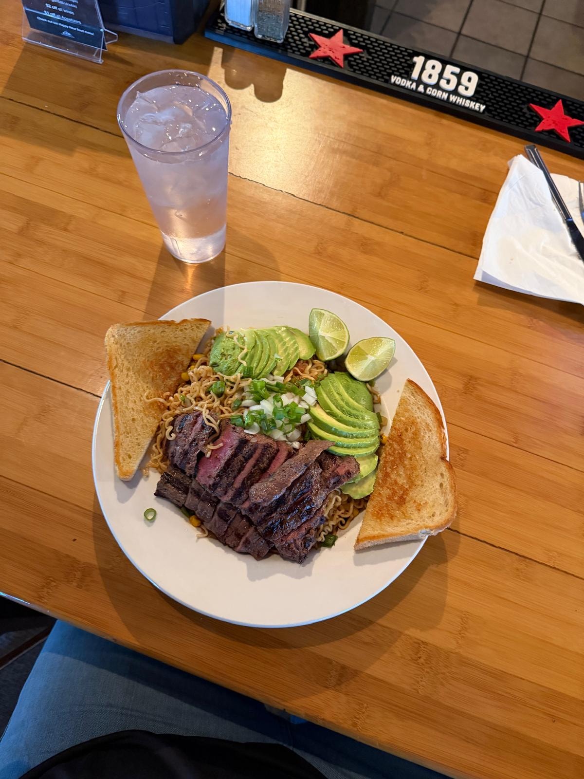 Sliced steak noodle bowl with avocado at Westrail
